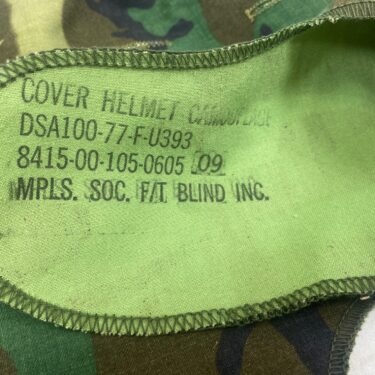 An M-1 Helmet Cover, Transitional Pattern used condition 1977 dated