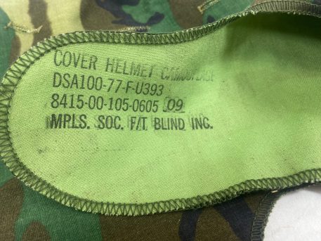 An M-1 Helmet Cover, Transitional Pattern used condition 1977 dated