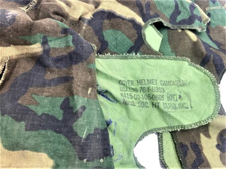 An M-1 Helmet Cover, Transitional Pattern used condition 1976 dated
