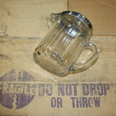 p 26206 otg62 korean war syrup pitchers  2