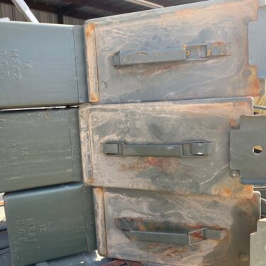50 cal ammo cans stacked on pallets