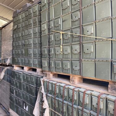 50 cal ammo cans stacked on pallets