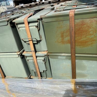 50 cal ammo cans stacked on pallets